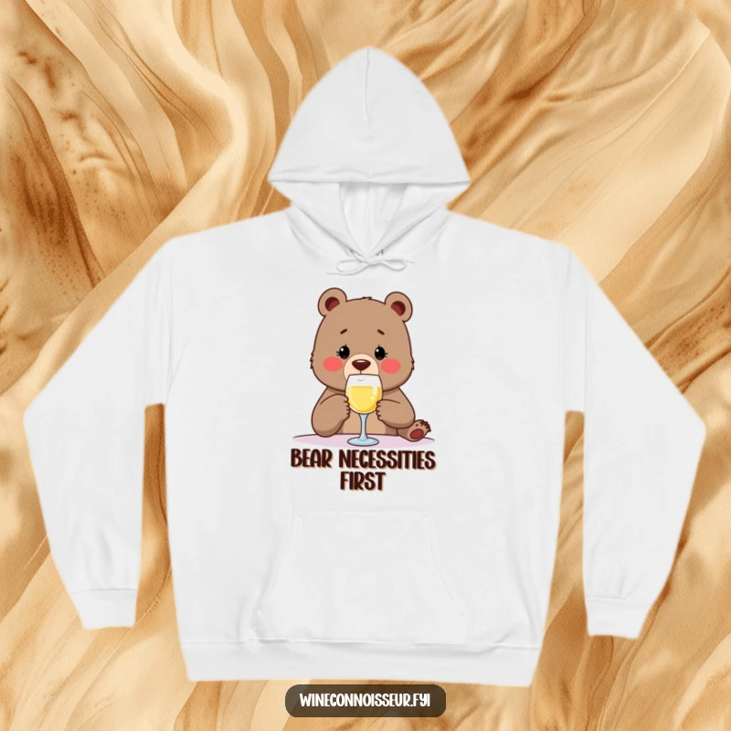 Funny bear hoodie design showing a determined bear with a wine glass, enjoying a tiny sip with a sophisticated and humorous expression.